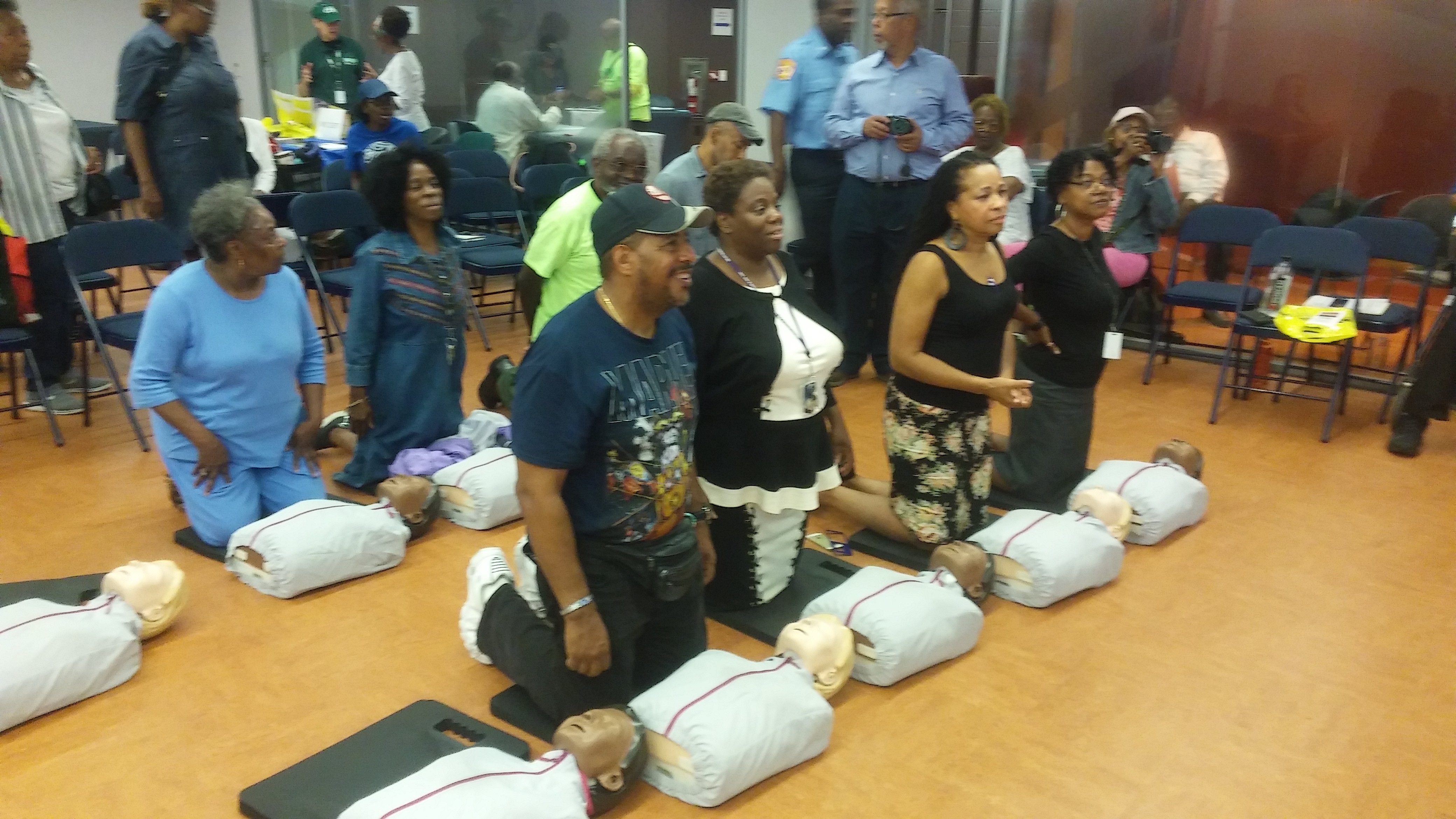 Group of people practicing cpr